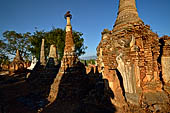 Inle Lake Myanmar. Indein, on the summit of a hill the  Shwe Inn Thein Paya a cluster of hundreds of ancient stupas. Many of them are ruined and overgrown with bushes. 